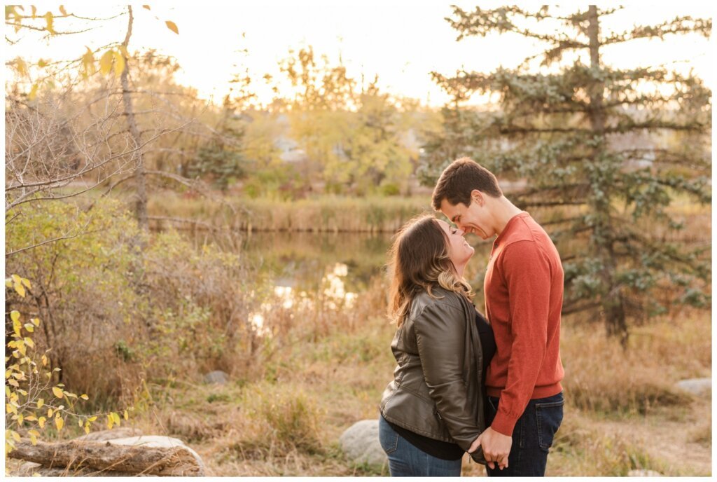 Regina Engagement Photography - Ben & Megan - Engagement Session at AE Wilson Park and Island - 15 - Sunset kiss on AE Wilson Island