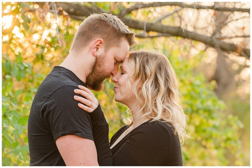 Tyrel & Allison - Regina Anniversary Session - Douglas Park Hill - 02 - Couple in golden light in fall