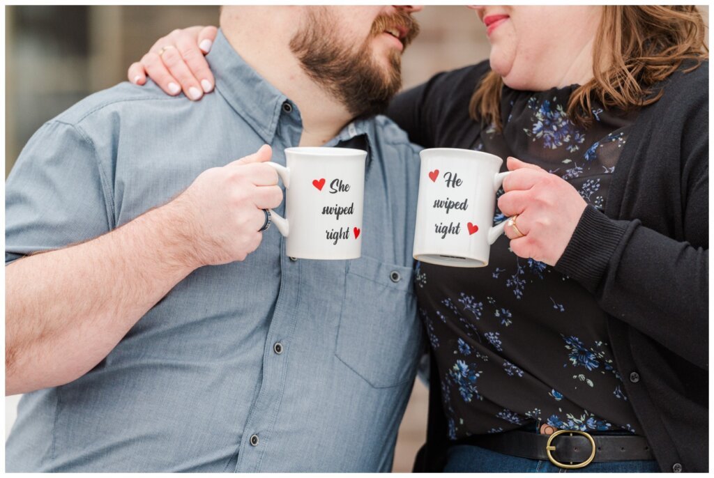 Paul & Lubomyra giving a cheers with their custom mugs