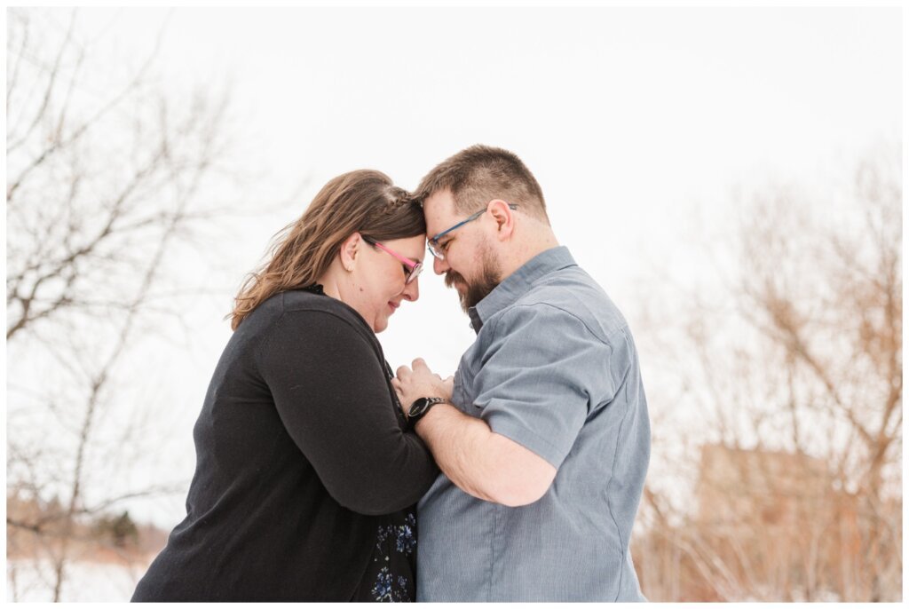 Couple resting their heads together