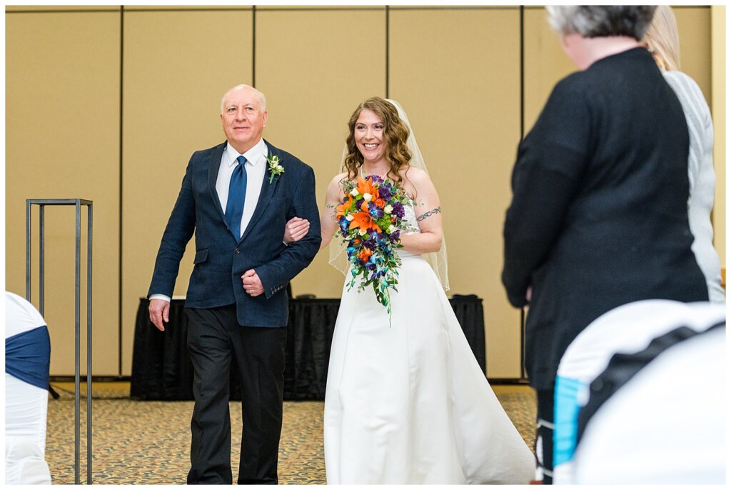 Matt & Ruth - 2022 Wedding - Queensbury Convention Centre - Regina Wedding - Bride makes grand entrance with her father