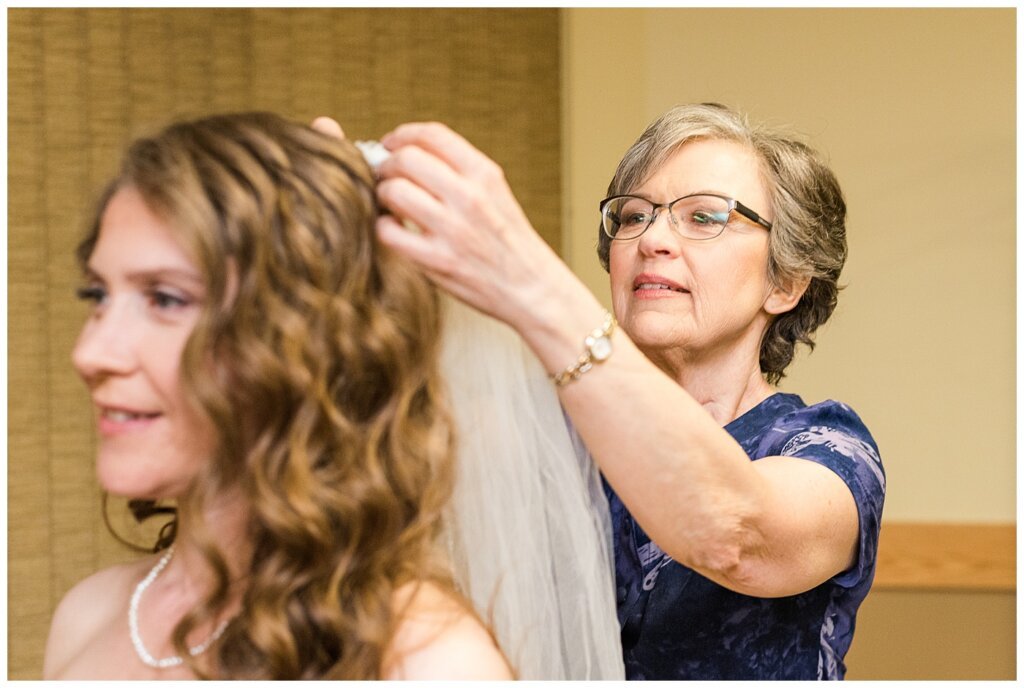 Matt & Ruth - 2022 Wedding - Queensbury Convention Centre - Regina Wedding - Brides mother puts on her veil