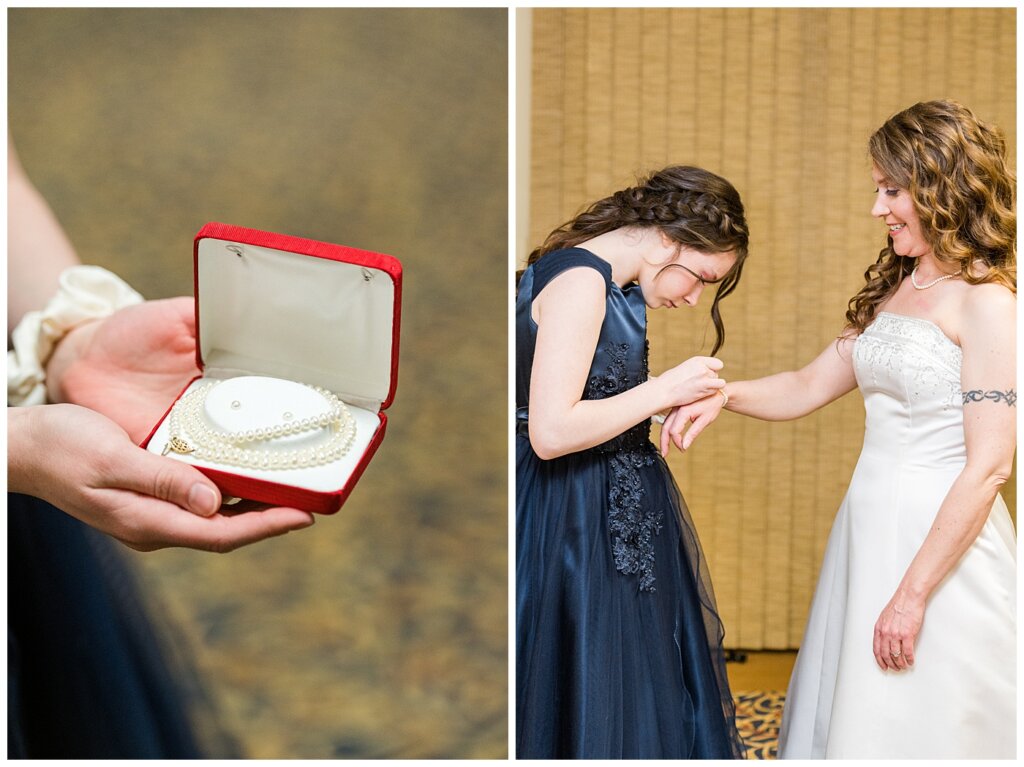 Matt & Ruth - 2022 Wedding - Queensbury Convention Centre - Regina Wedding - Flower girl puts on mothers pearls