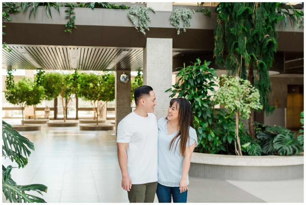 Couple walking through the foyer of Mackenzie Art Gallery