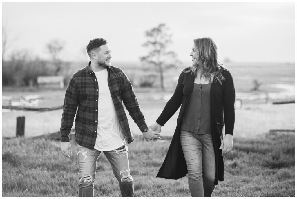 Couple strolling through a field in Grand Coulee