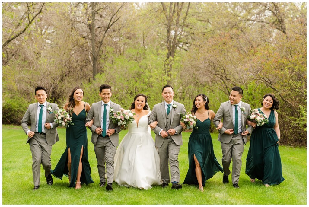 Sam & Benton - Wascana Park - 18 - Bridal Party Walks together 