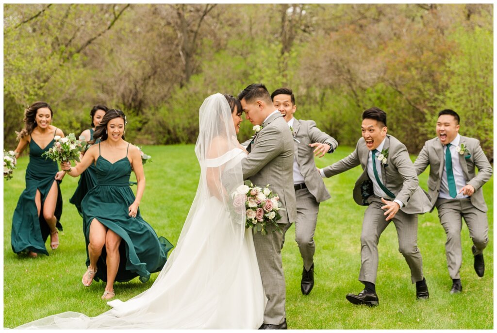 Sam & Benton - Wascana Park - 25 - Bride & groom rushed by the bridal party