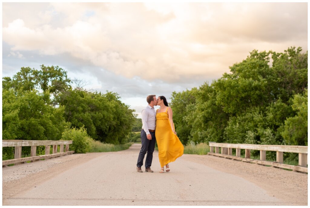 Adam Caitlin 13 Lumsden Valley Couple share a kiss as they cross the bridge