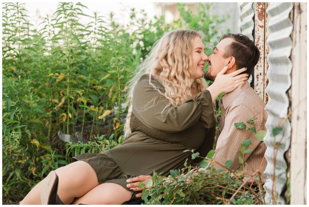 Orrin & Jade - 06 - Weyburn Engagement - Couple giggles as they go in for a kiss