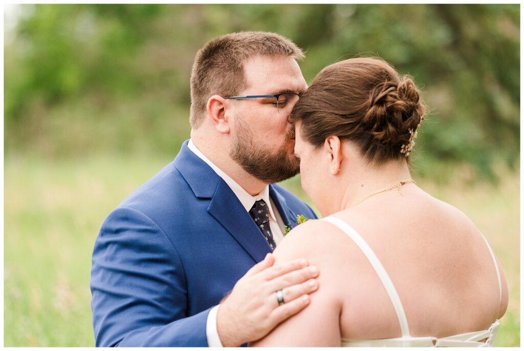 Paul & Lubomyra - Ukrainian Wedding - 14 - Groom kissing brides forehead