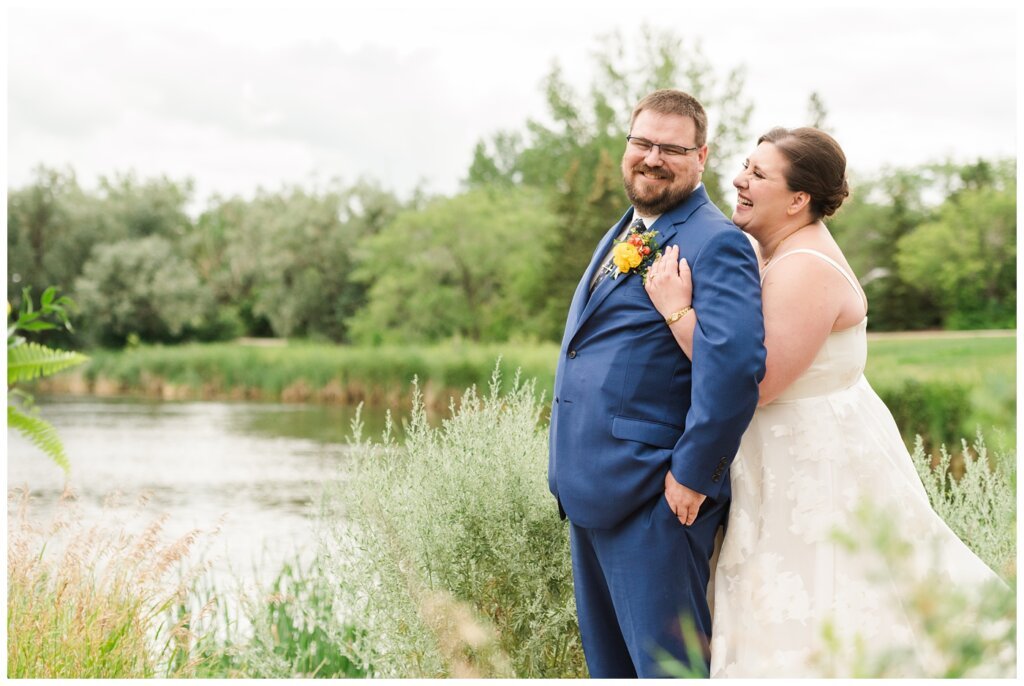 Paul & Lubomyra - Ukrainian Wedding - 16 - Bride & Groom laughing in a park