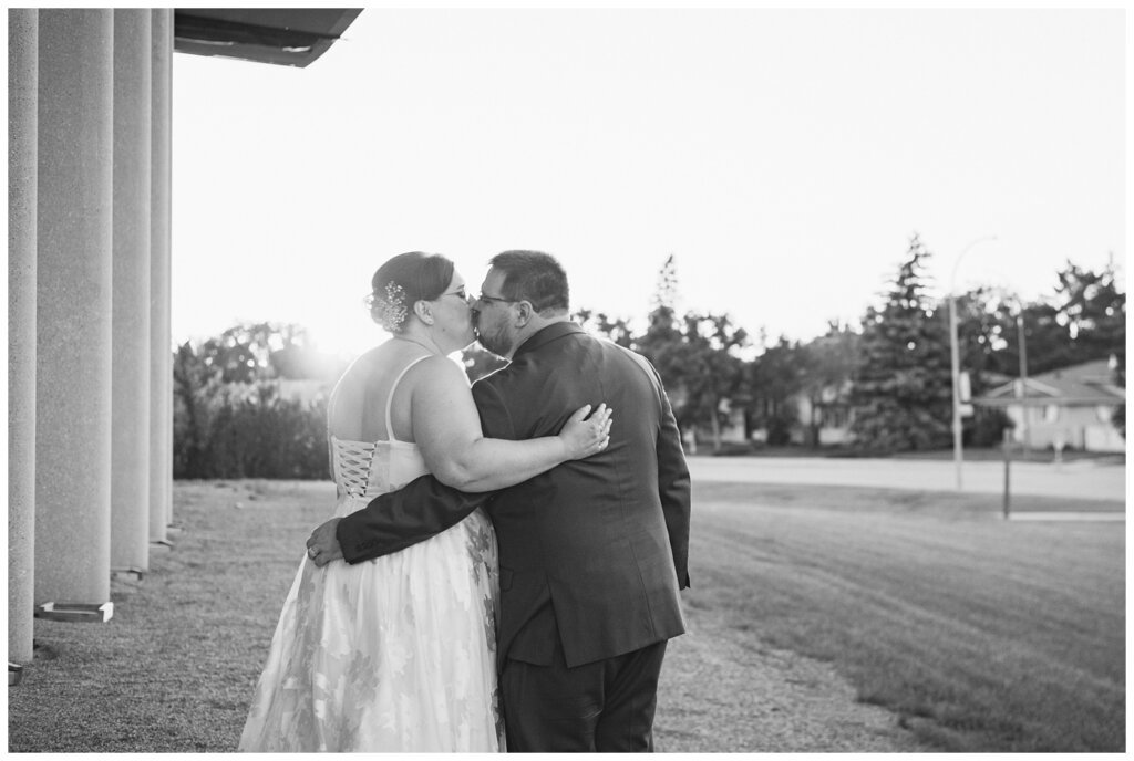 Paul & Lubomyra - Ukrainian Wedding - 37 - Black and white sunset kiss of bride and groom