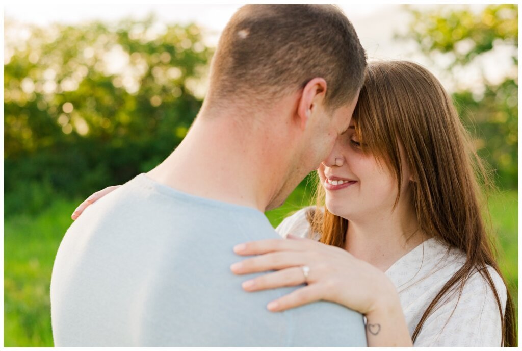 Ryan & Melissa - 04 - Wascana Habitat Conservation Area - Bride to be shows off her ring and heart tattoo on her wrist