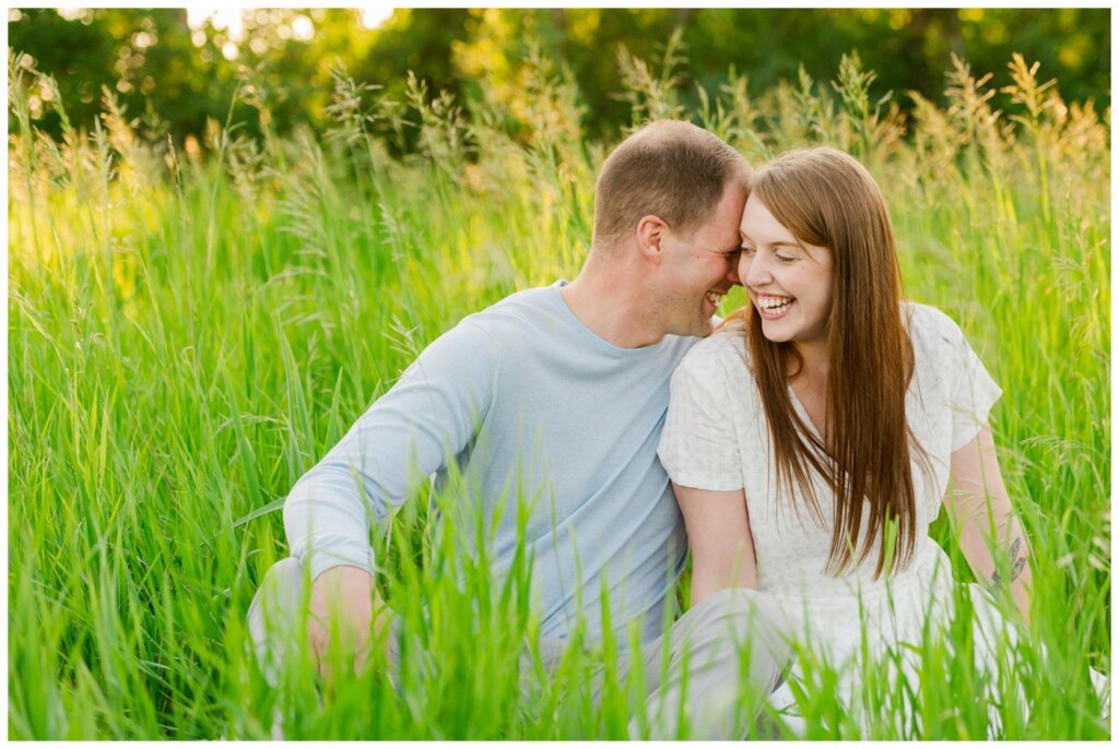 Ryan & Melissa - 05 - Wascana Habitat Conservation Area - Couple sits in the tall grass