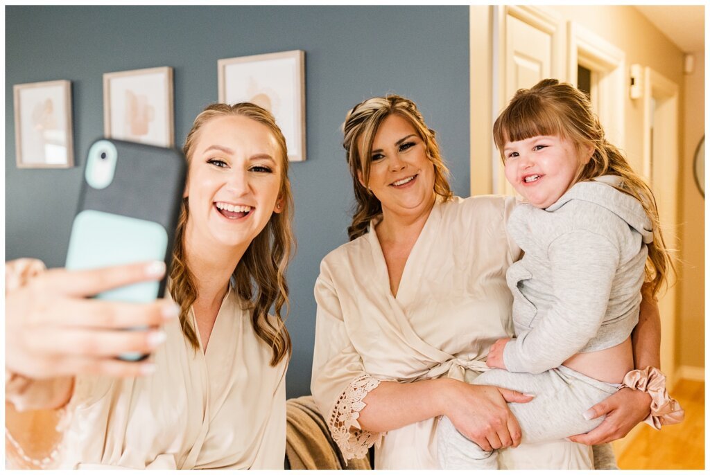 Tris & Jana - Lumsden Wedding - 08 - Bridesmaids pause for a selfie in their robes