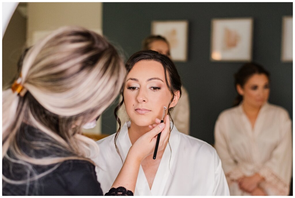 Tris & Jana - Lumsden Wedding - 10 - Final makeup touches by Ash Wouters Makeup Artist
