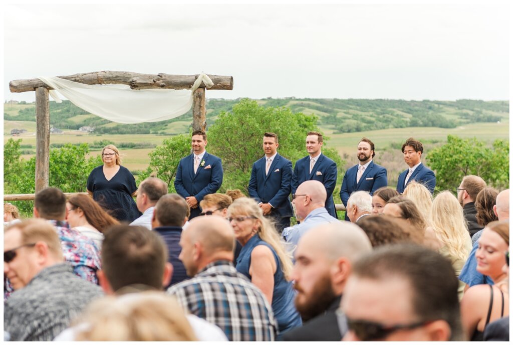 Tris & Jana - Lumsden Wedding - 14 - Groom waits for his bride overlooking Lumsden Valley