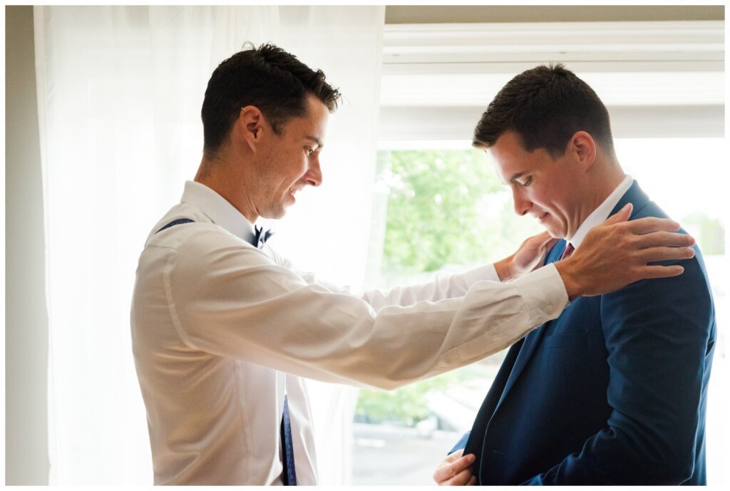 Ben & Megan - 04 - Regina Wedding - Brother helps prep the groom