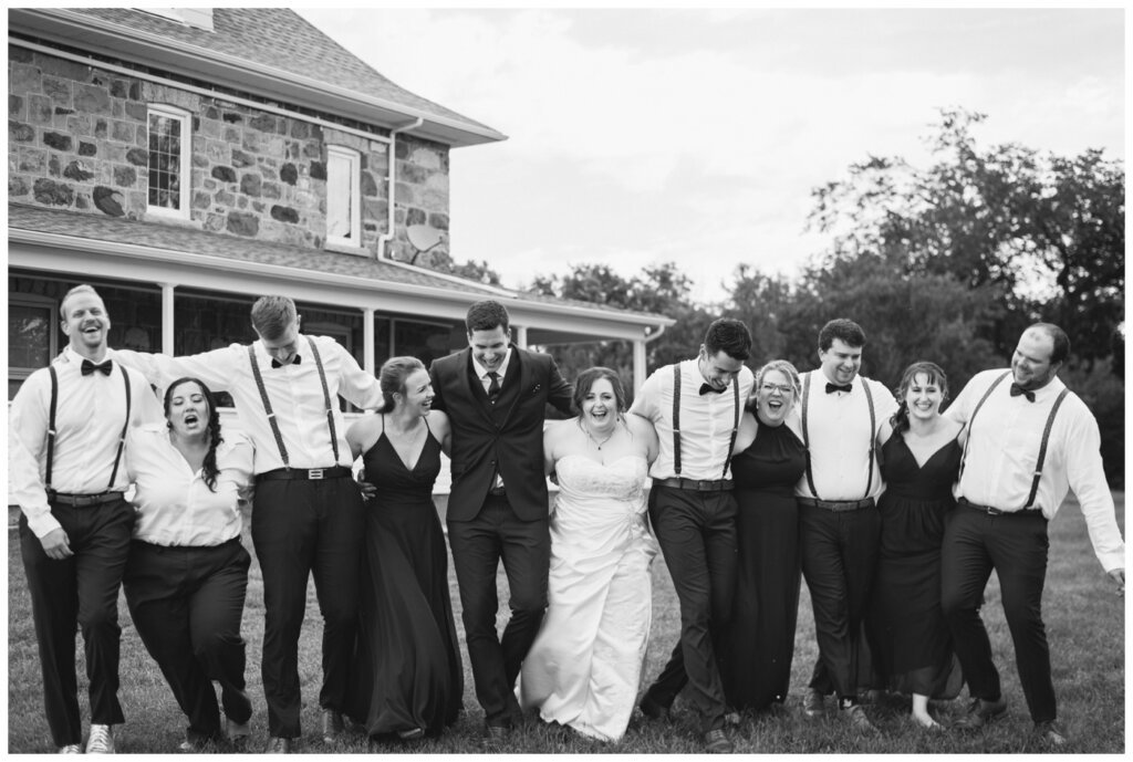 Ben & Megan - 18 - Regina Wedding - Bridal party walks together