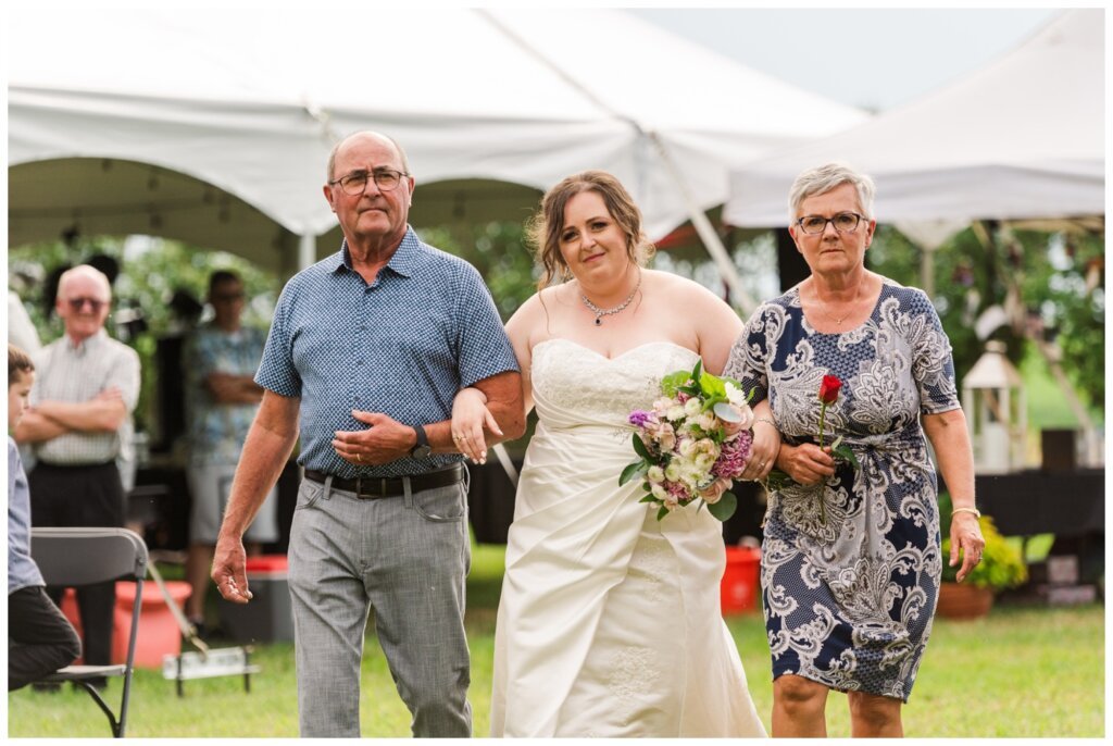 Ben & Megan - 25 - Regina Wedding - Bride escorted by her parents