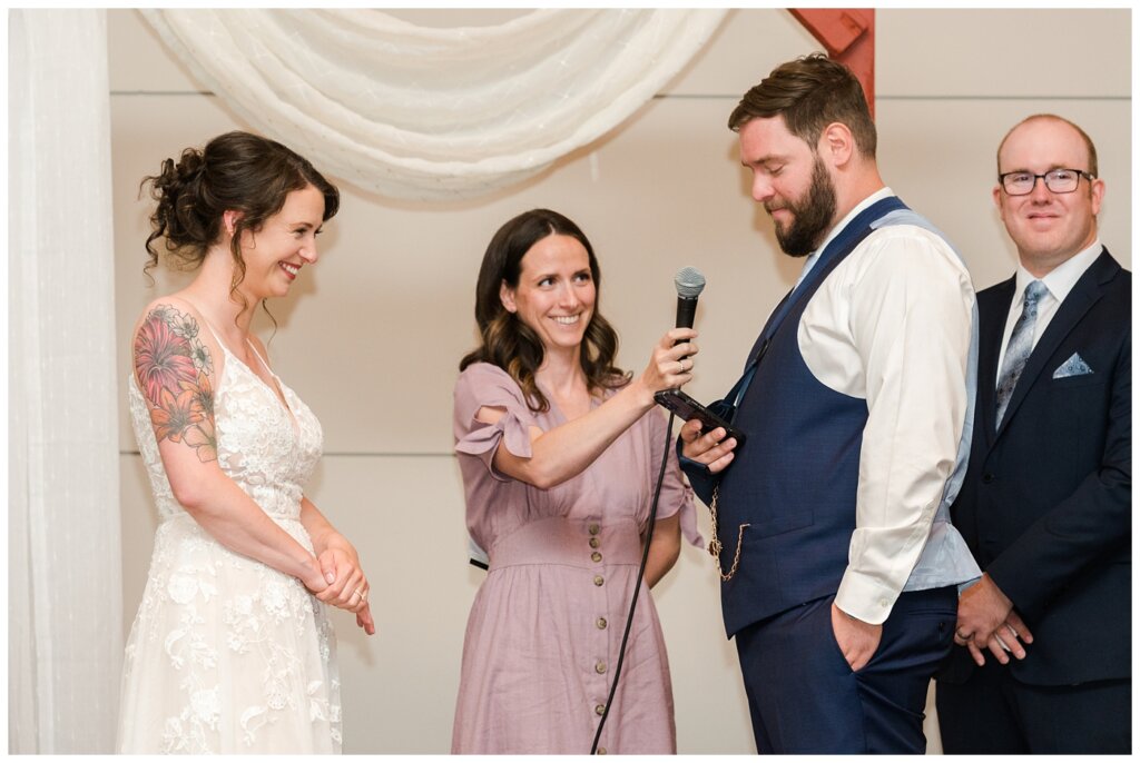 Mitch & Val - 33 - Regina Wedding - Groom makes his vows to his bride