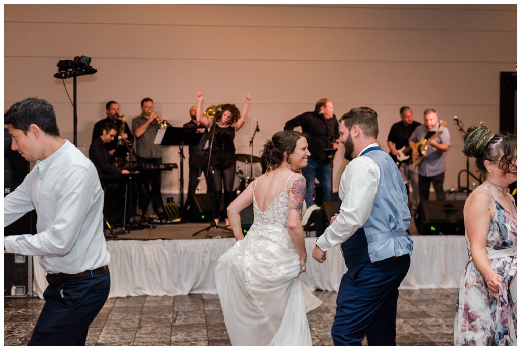 Mitch & Val - 35 - Regina Wedding - Bride & groom dance the night away with The New Montagues