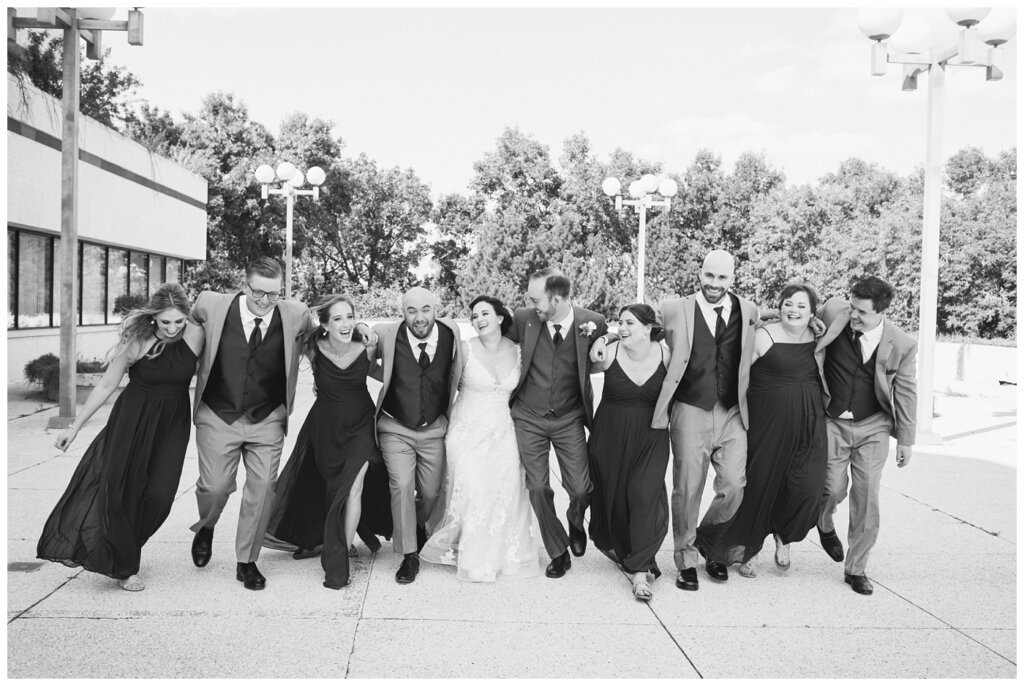 Andrew & Alisha - Regina Wedding Photography - 21 - Bridal Party share a hug and a laugh