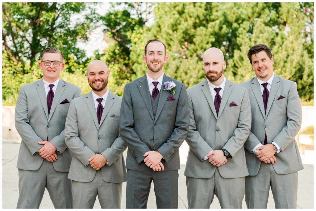 Andrew & Alisha - Regina Wedding Photography - 22 - Groom with his groomsmen in their grey suits from Moores