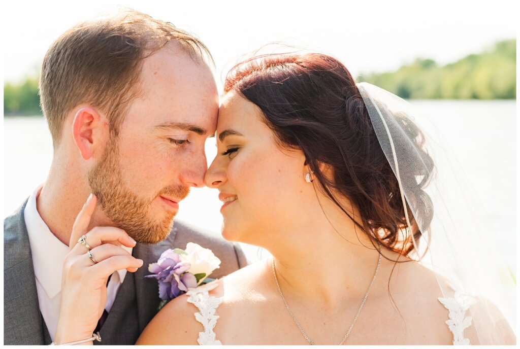 Andrew & Alisha - Regina Wedding Photography - 33 - Bride & Groom share an intimate moment in Wascana Park