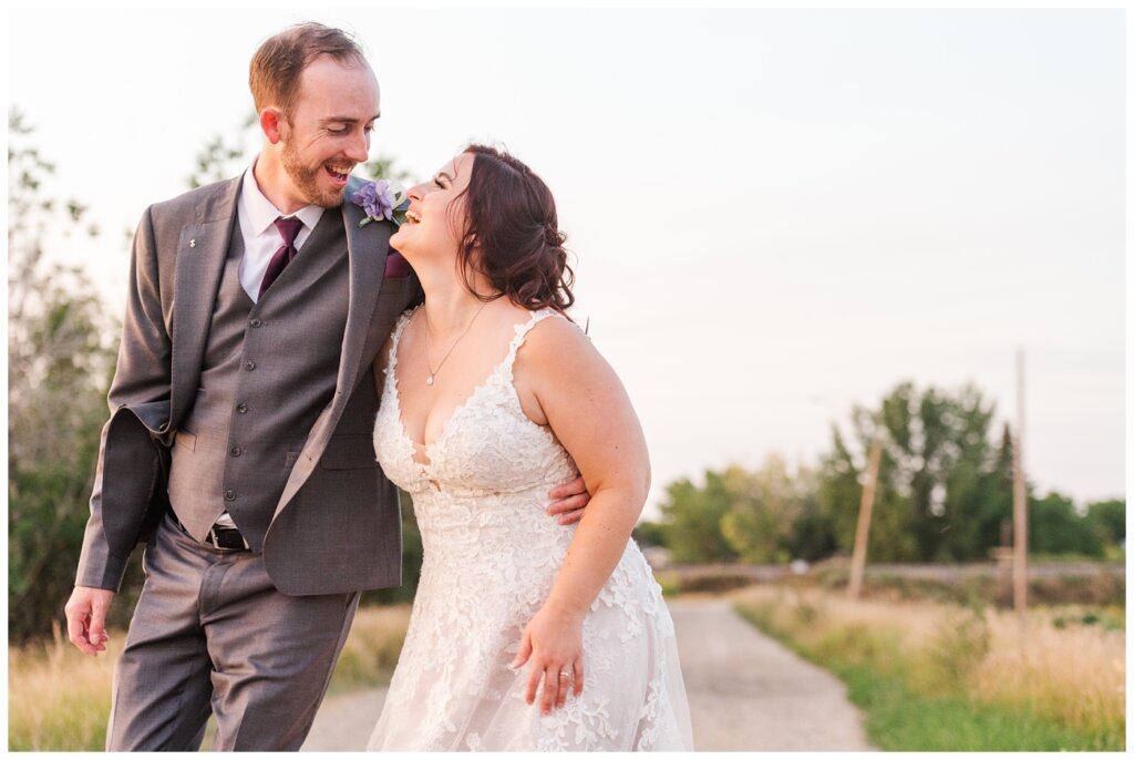 Andrew & Alisha - Regina Wedding Photography - 43 - Bride & Groom together on a dirt road