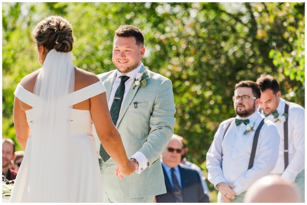 Declan & Katherine - 37 - Regina Wedding - Groom stares lovingly at his bride