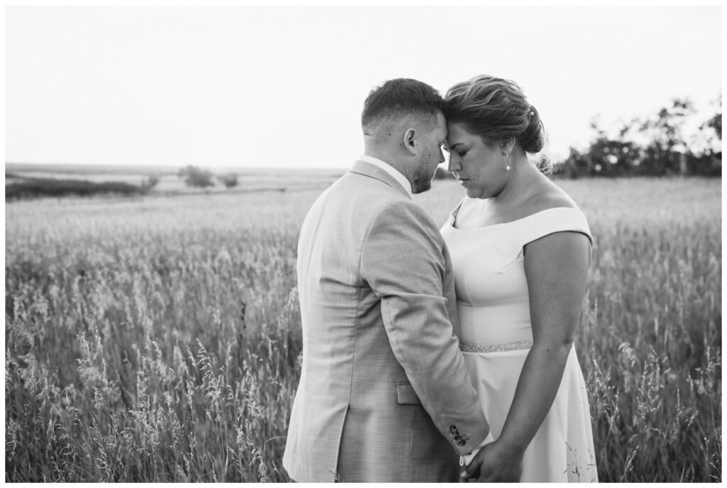 Declan & Katherine - 43 - Regina Wedding - Bride & groom take a quiet moment at sunset