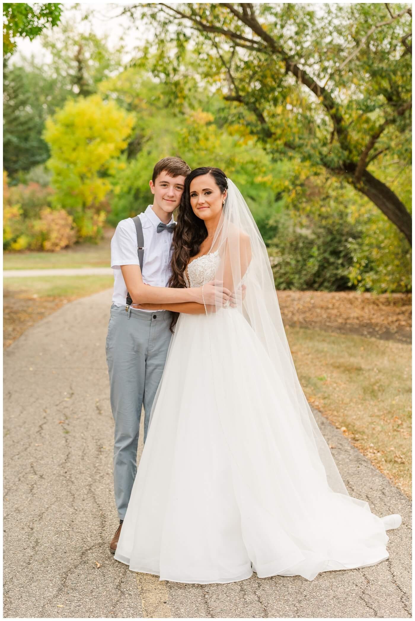 Adam & Caitlin - 21 - Regina Wedding - Bride with her oldest son