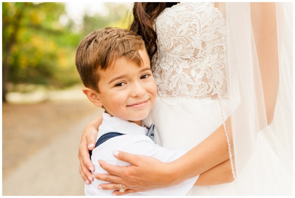 Adam & Caitlin - 22 - Regina Wedding - Bride with her second oldest son
