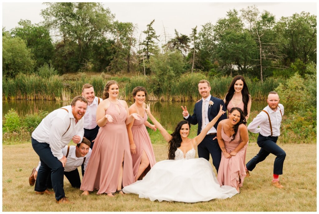 Adam & Caitlin - 25 - Regina Wedding - Bridal party having fun