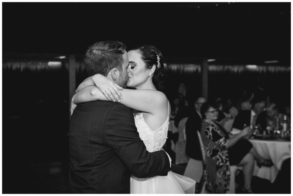 Adam & Caitlin - 37 - Regina Wedding - Bride & Groom kiss after their first dance