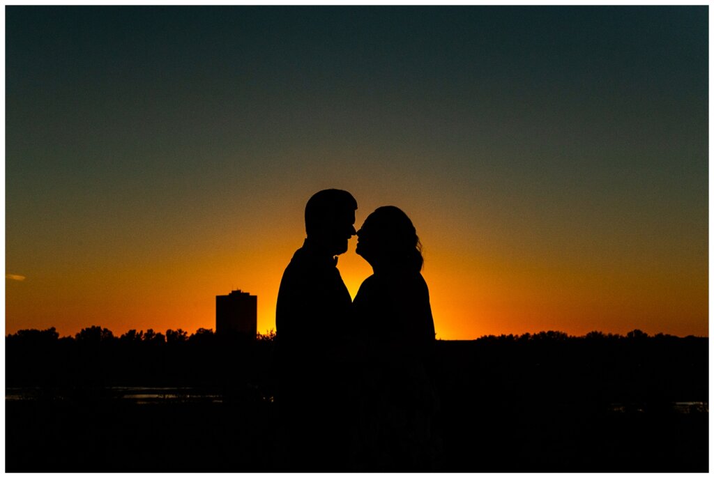 Jared & Haley - Engagement Session - 11 - Silhouette of couple at top of Douglas Park Hill