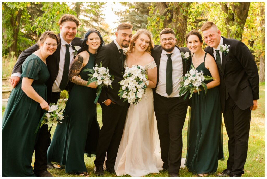 Orrin-Jade-33-Weyburn-Wedding-Wedding-party-in-their-green-accent-ties-and-dresses