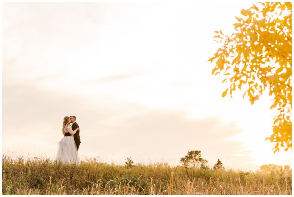 Orrin-Jade-36-Weyburn-Wedding-Bride-wrapped-up-by-her-groom