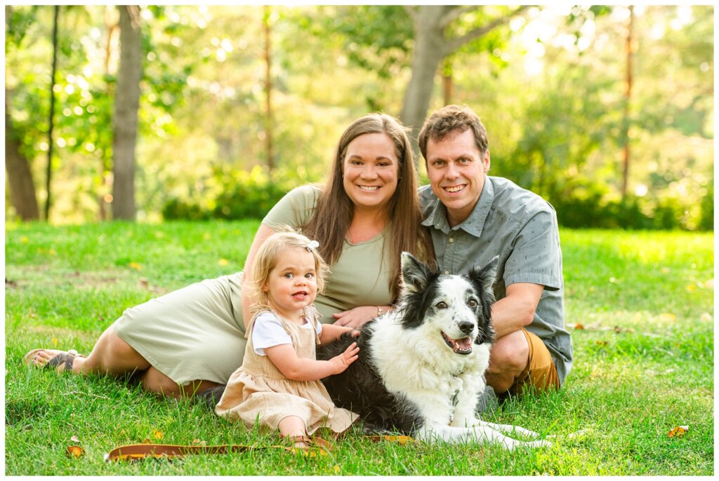 Filby Family 2023 - 04 - Family of three sits with their black and white dog