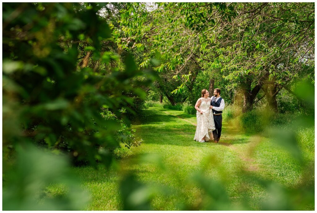 Jared & Haley - 23 - Bride & Groom as they walk through Les Sherman Park