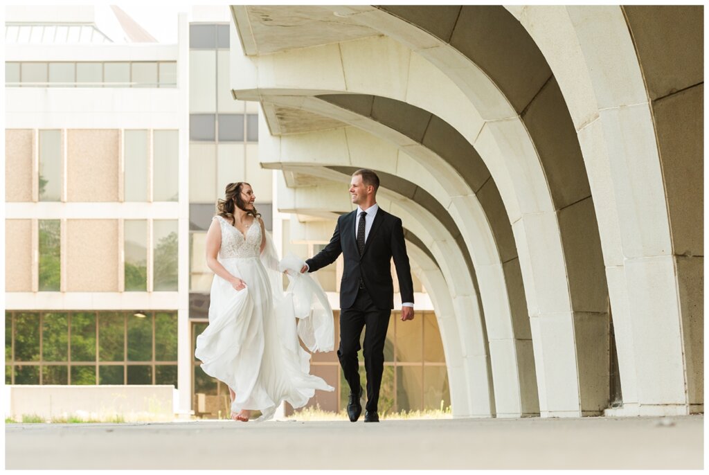 Ryan & Melissa - Hotel Sask Wedding - 10 - Bride & Groom frolicking together