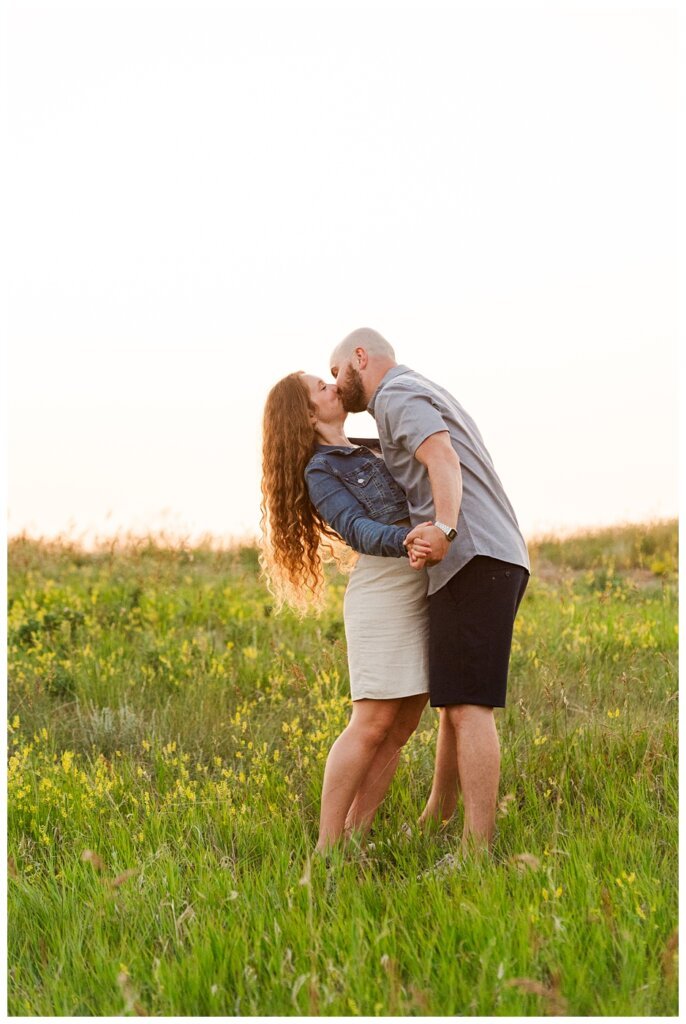 Spencer & Taylor - 13 - Sunset kiss of couple at wascana trails