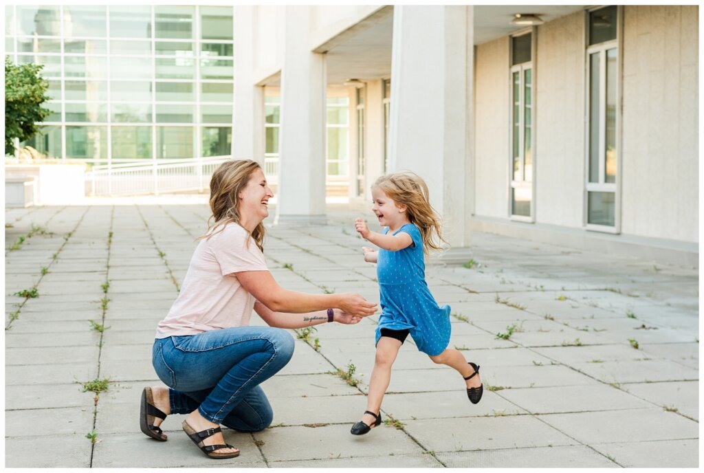 Eyre Family - University of Regina - 01 - Little girl runs into her moms arms