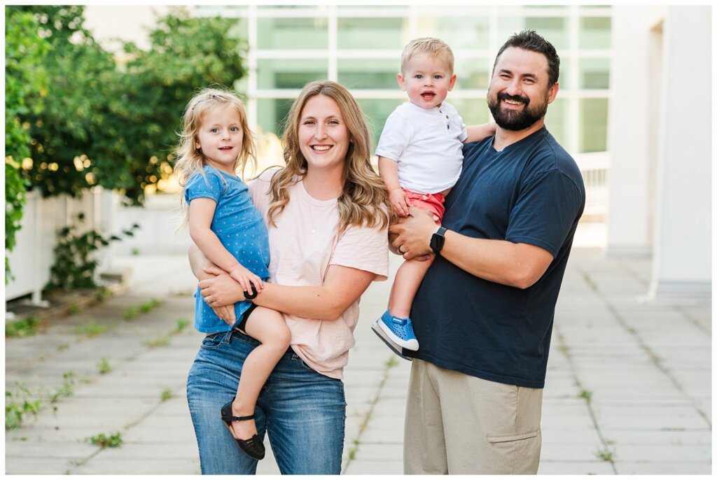 Eyre Family - University of Regina - 03 - Mom and dad hold their children