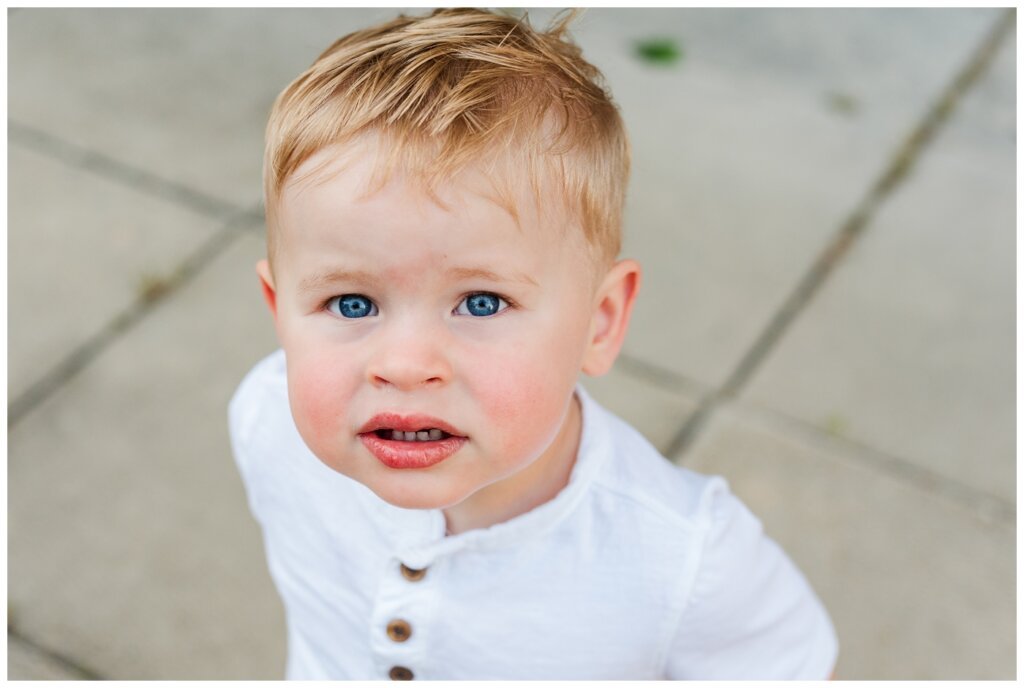 Eyre Family - University of Regina - 10 - Little boy stares into the camera with big blue eyes