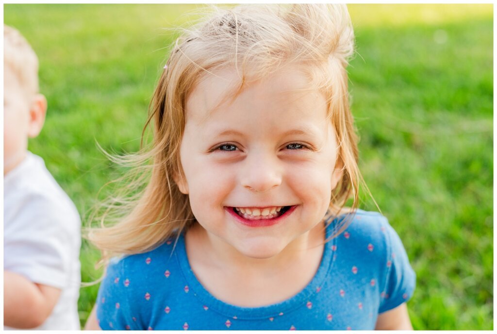 Eyre Family - University of Regina - 18 - Little girl smiles into the camera