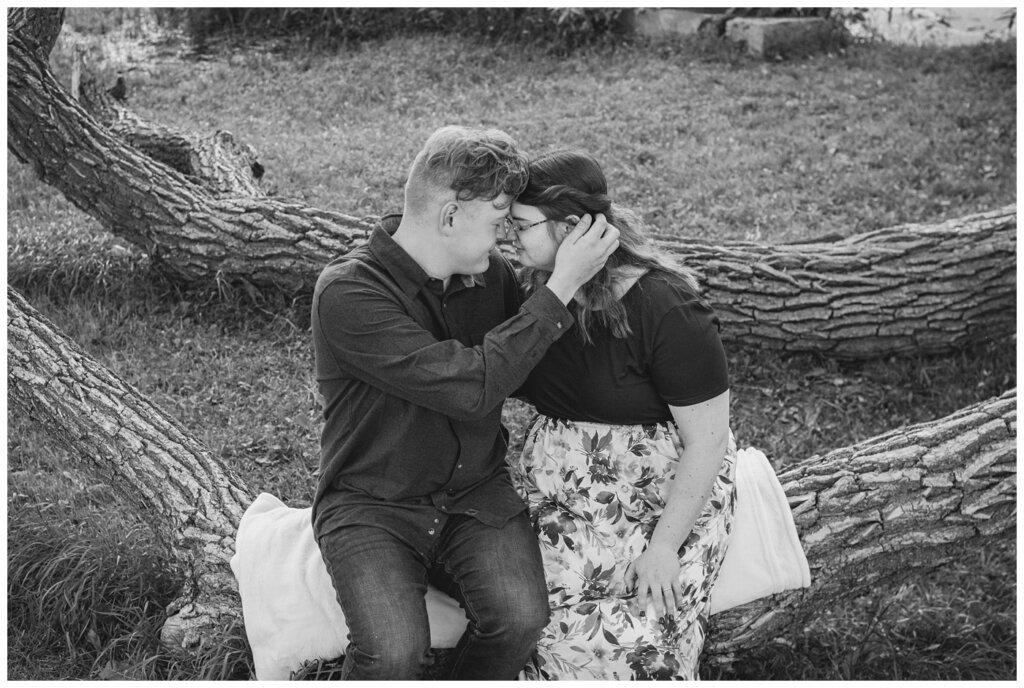 Kenny-Marrick-Engagement-Our-Lady-of-Lourdes-Shrine-06-Groom-to-be-brushes-his-brides-hair-back