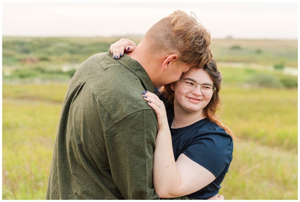 Kenny-Marrick-Engagement-Our-Lady-of-Lourdes-Shrine-12-Groom-whispers-in-his-brides-ear