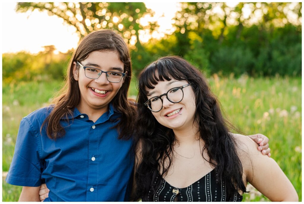 Strachan & McPhee Extended Family - Wascana Habitat Conservation Area - 02 - Brother and sister smile together at sunset